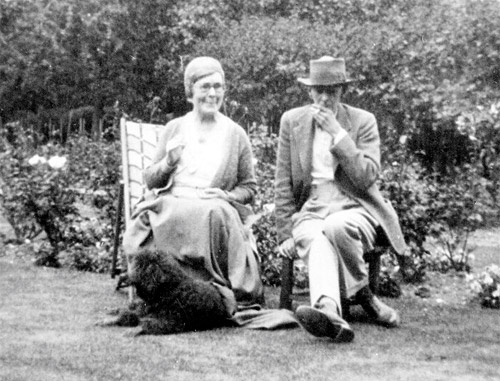 Dorothy Richardson, Alan Odle and dog in a garden